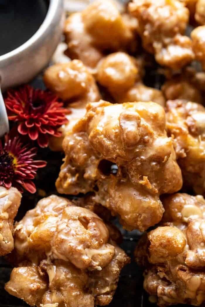 Cinnamon Spiced Apple Fritters with Vanilla Coffee Glaze | halfbakedharvest.com overhead close up photo of Cinnamon Spiced Apple Fritters with Vanilla Coffee Glaze