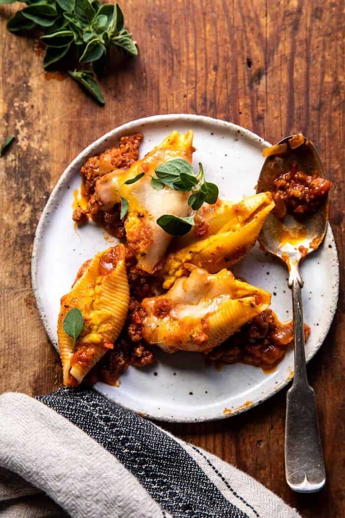 overhead photo of Pumpkin Cheese Stuffed Pasta Bolognese Bake on dinner plate