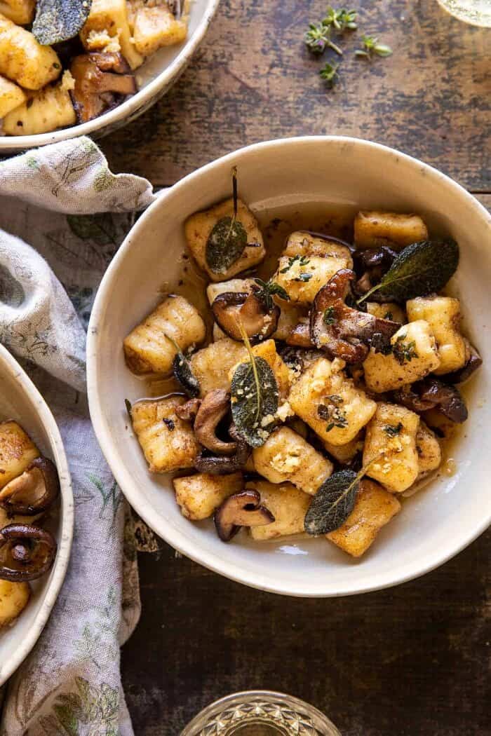 Ricotta Gnocchi with Herby Mushrooms and Sage Browned Butter | halfbakedharvest.com overhead close up photo of Ricotta Gnocchi with Herby Mushrooms and Sage Browned Butter