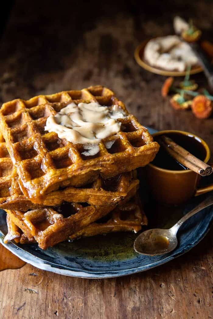 Cider Pumpkin Waffles with Salted Maple Butter | halfbakedharvest.com side photo of Cider Pumpkin Waffles with Salted Maple Butter