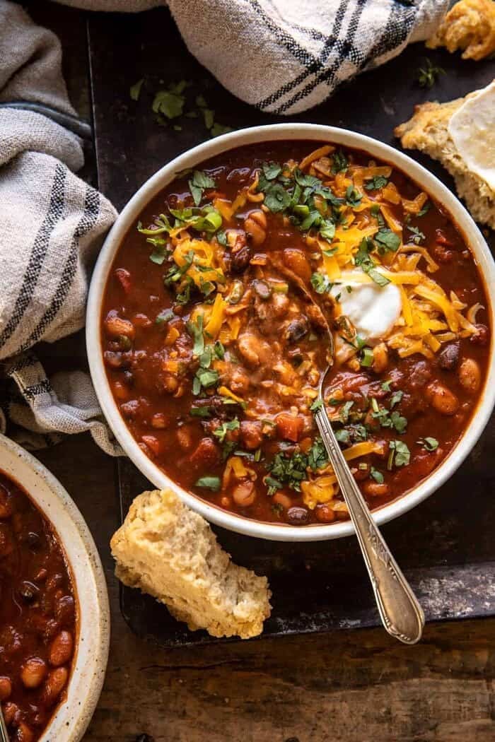 Healthy Slow Cooker Chipotle Bean Chili | halfbakedharvest.com overhead photo of Healthy Slow Cooker Chipotle Bean Chili with spoon in bowl