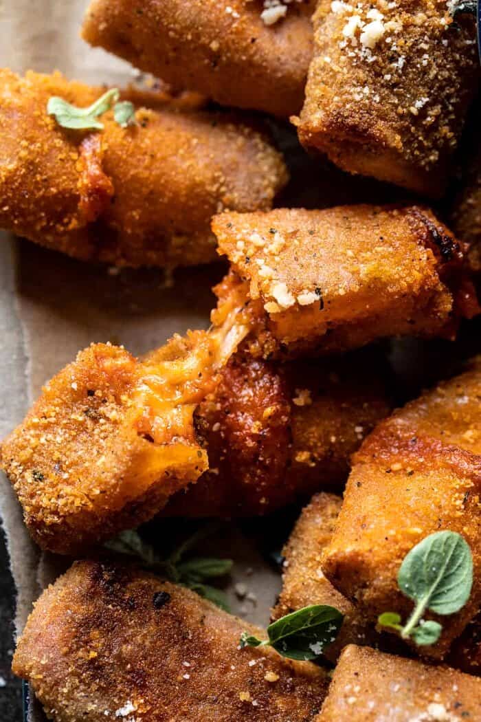 Homemade Cheesy Pizza Rolls | halfbakedharvest.com close up photo of Homemade Cheesy Pizza Rolls