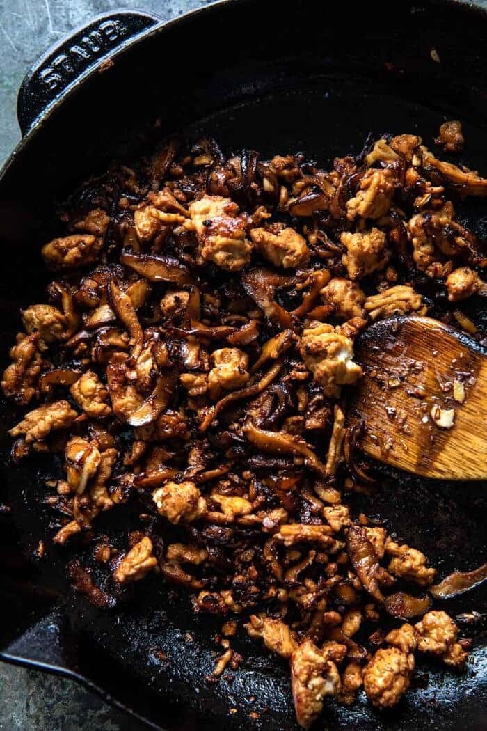 30 Minute Spicy Sesame Noodles with Ginger Chicken | halfbakedharvest.com overheah prep photo of Ginger Chicken in skillet