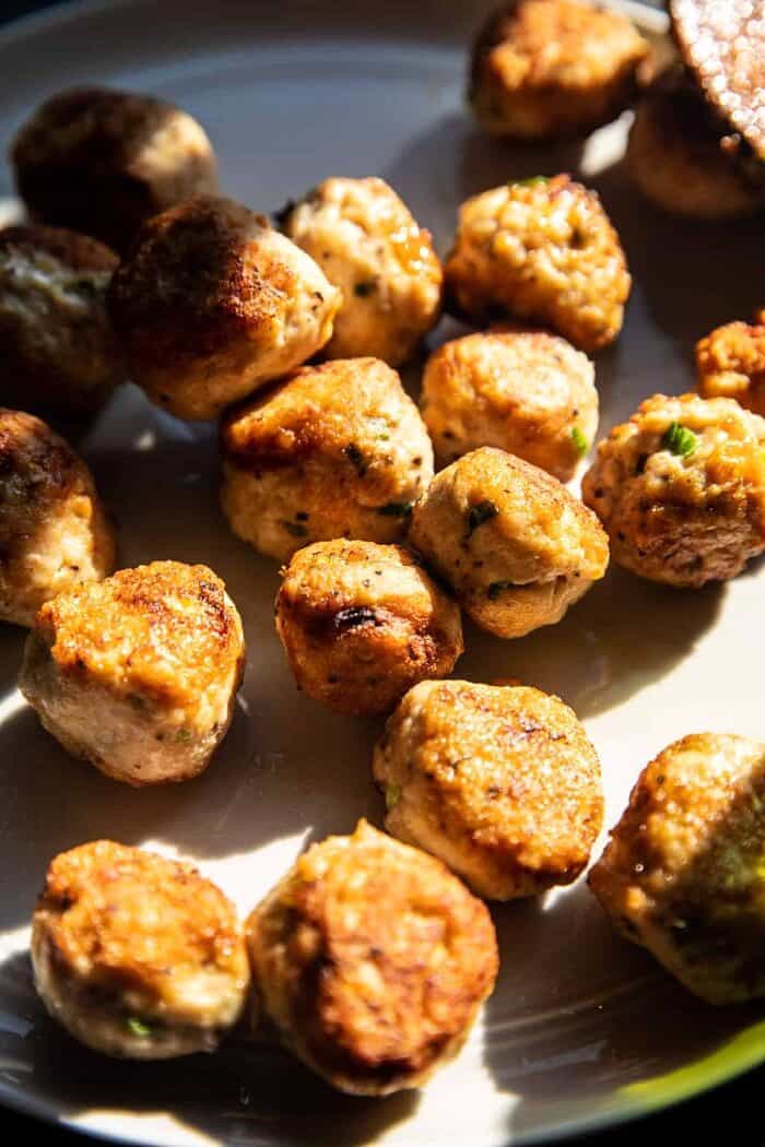 Creamy Coconut Chicken Meatball and Noodle Curry | halfbakedharvest.com prep photo of Chicken Meatballs after cooking