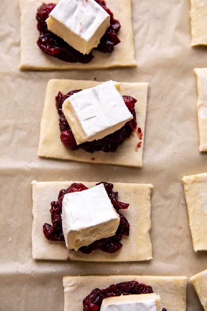 Pastry Wrapped Cranberry Baked Brie Bites | halfbakedharvest.com prep photo of Pastry Wrapped Cranberry Baked Brie Bites before baking