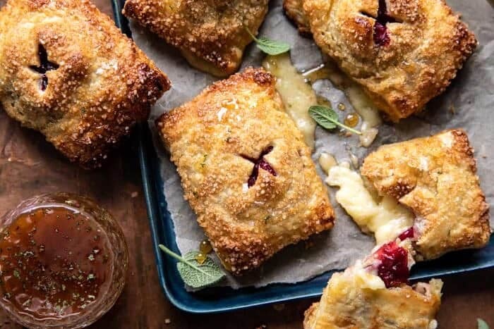 Pastry Wrapped Cranberry Baked Brie Bites | halfbakedharvest.com overhead horizontal photo of Pastry Wrapped Cranberry Baked Brie Bites