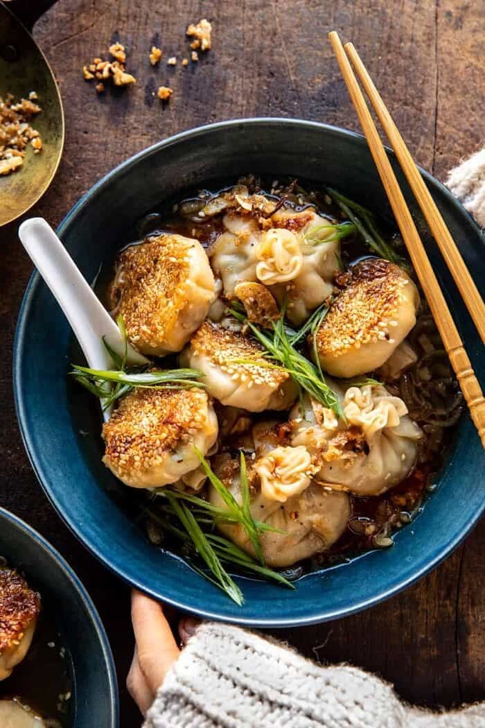 Sesame Chicken Dumplings in Spicy Broth with Garlic Crisps | halfbakedharvest.com