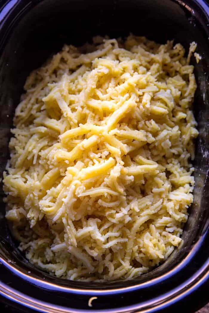Slow Cooker Cheesy Garlic Herb Mashed Potatoes | halfbakedharvest.com prep photo of potatoes after ricing