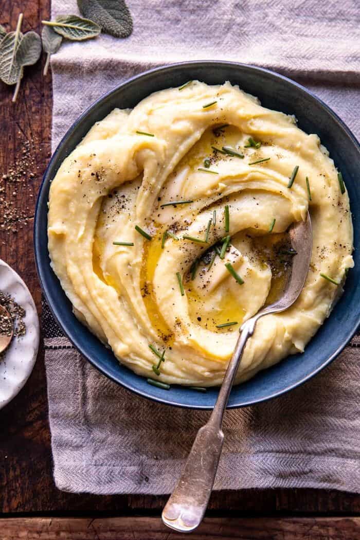 Slow Cooker Cheesy Garlic Herb Mashed Potatoes | halfbakedharvest.com overhead photo of Slow Cooker Cheesy Garlic Herb Mashed Potatoes
