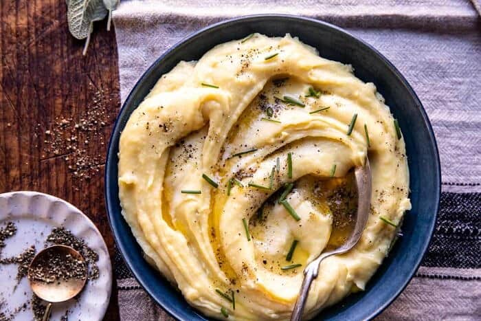 Slow Cooker Cheesy Garlic Herb Mashed Potatoes | halfbakedharvest.com overhead photo of Slow Cooker Cheesy Garlic Herb Mashed Potatoes