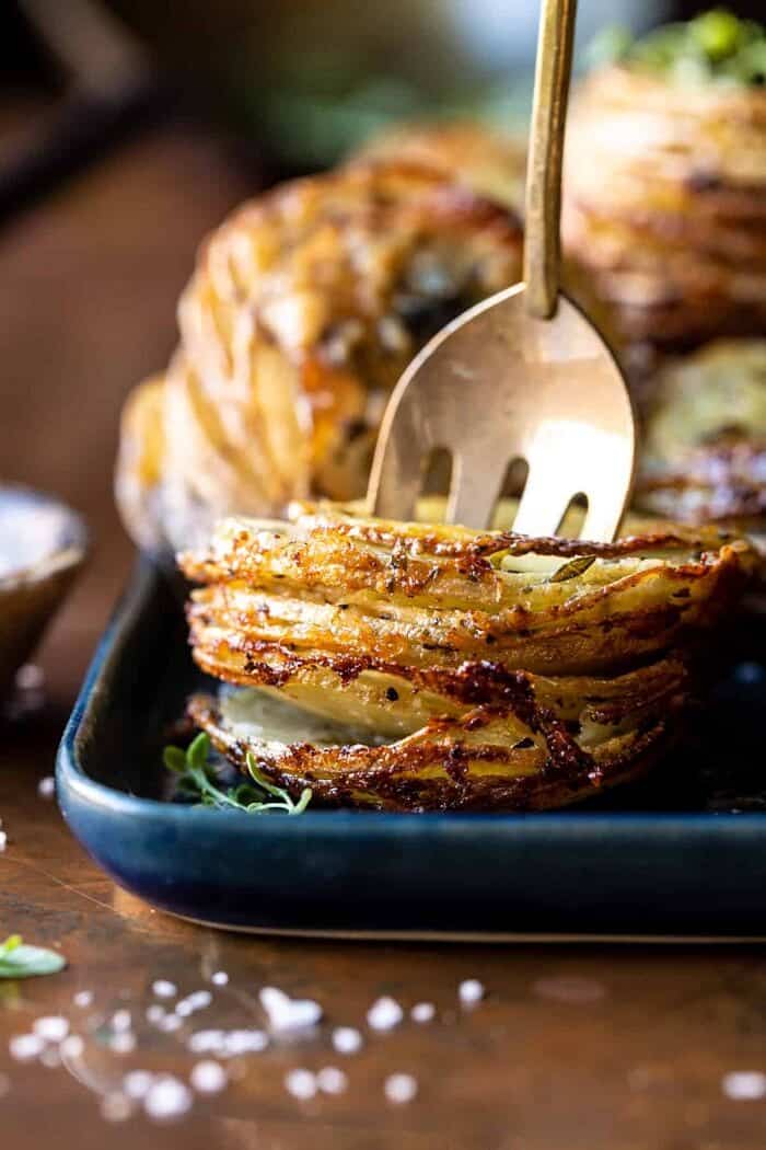 Crispy Cheesy Potato Stacks with fork in stack