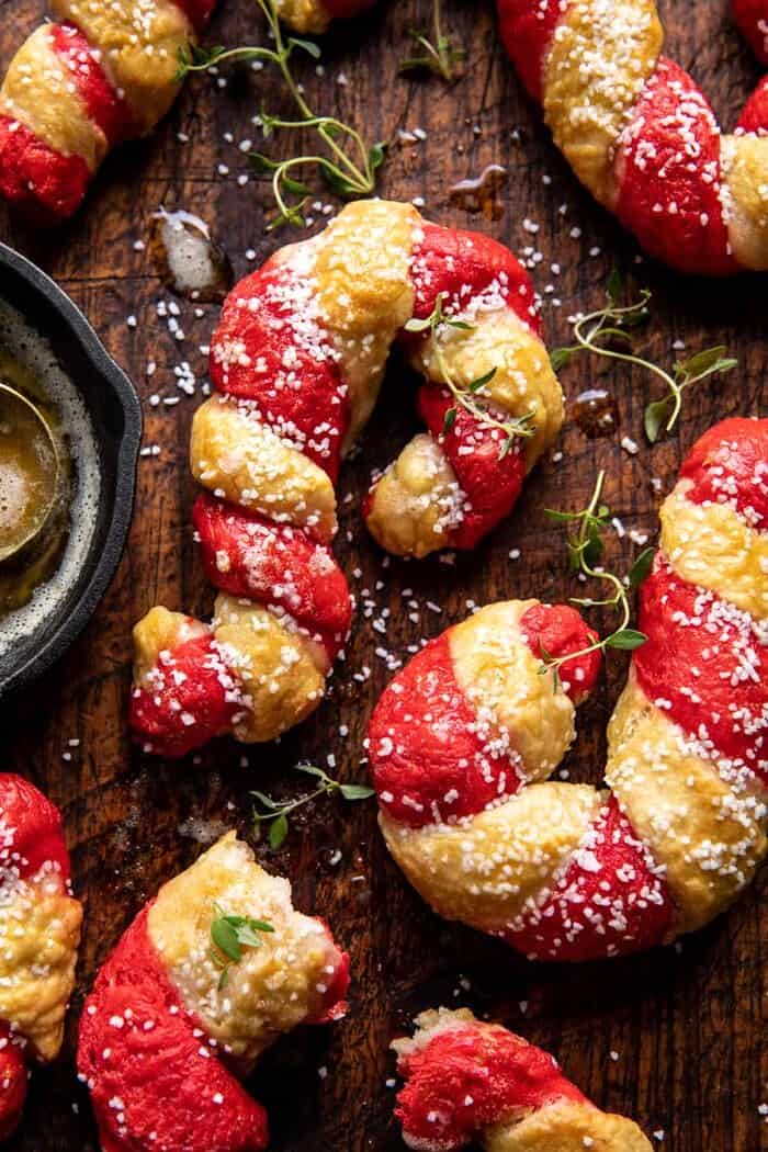 Salted Garlic Butter Candy Cane Bagels | halfbakedharvest.com overhead photo of Salted Garlic Butter Candy Cane Bagels