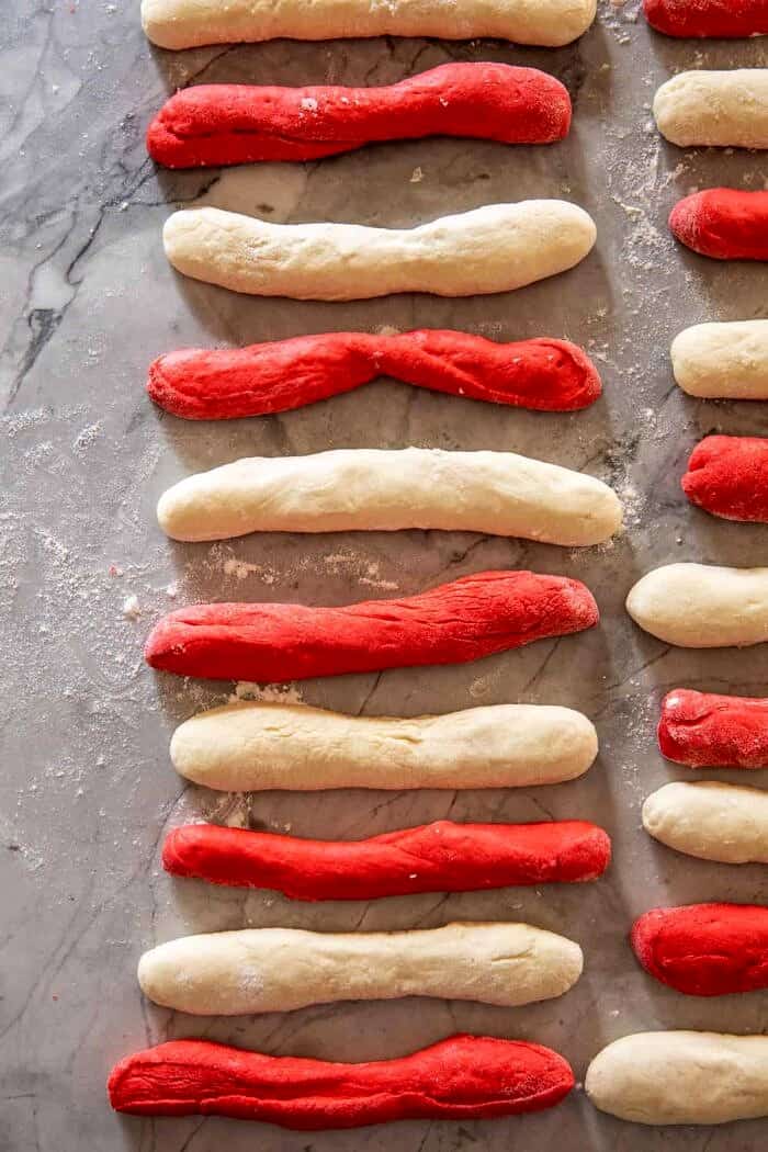 Salted Garlic Butter Candy Cane Bagels | halfbakedharvest.com prep photo of rolling the bagels