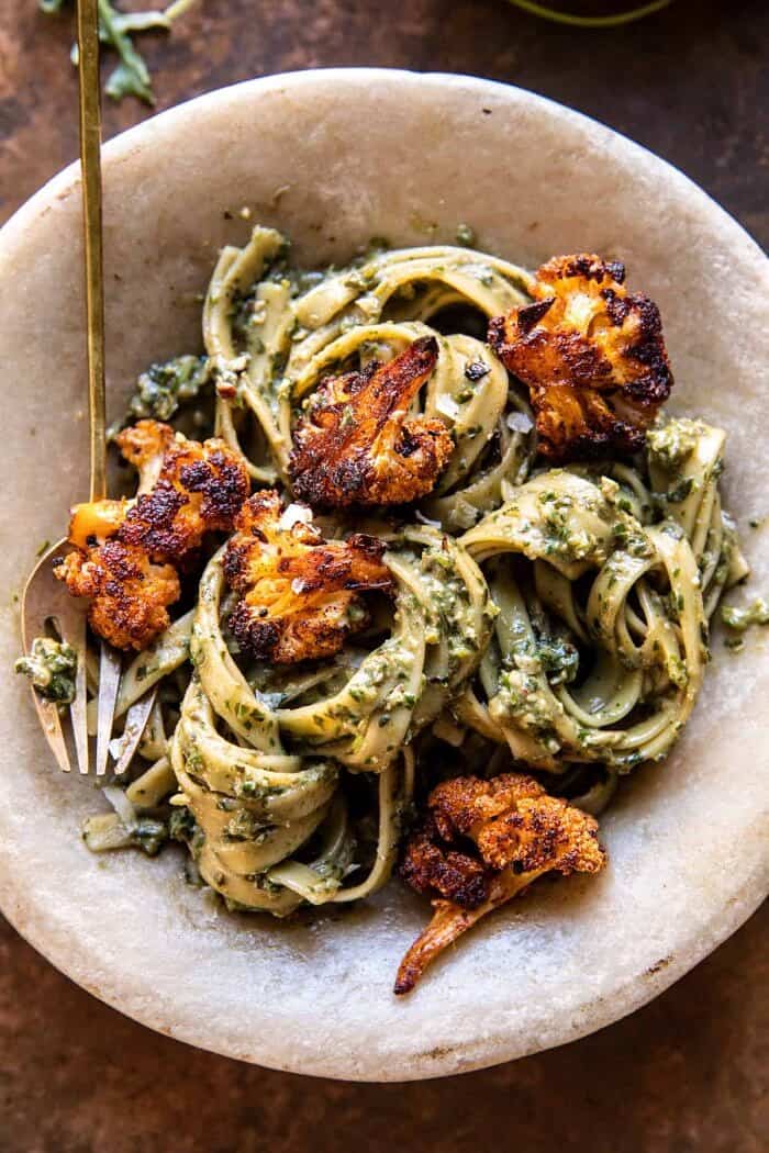overhead close up photo of Crispy Roasted Cauliflower with Creamy Pesto Pasta