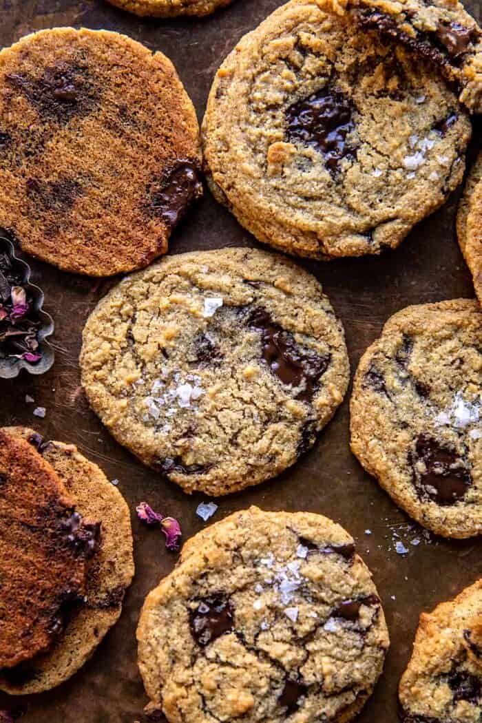 Salted Tahini Butter Chocolate Chip Cookies | halfbakedharvest.com overhead close up photo of Salted Tahini Butter Chocolate Chip Cookies