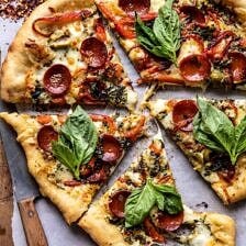 Pesto Pizza with Feta Stuffed Crust | halfbakedharvest.com