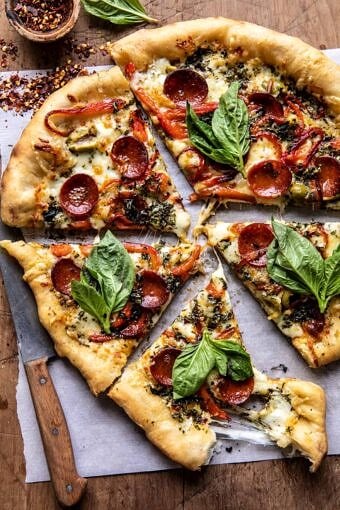 Pesto Pizza with Feta Stuffed Crust | halfbakedharvest.com
