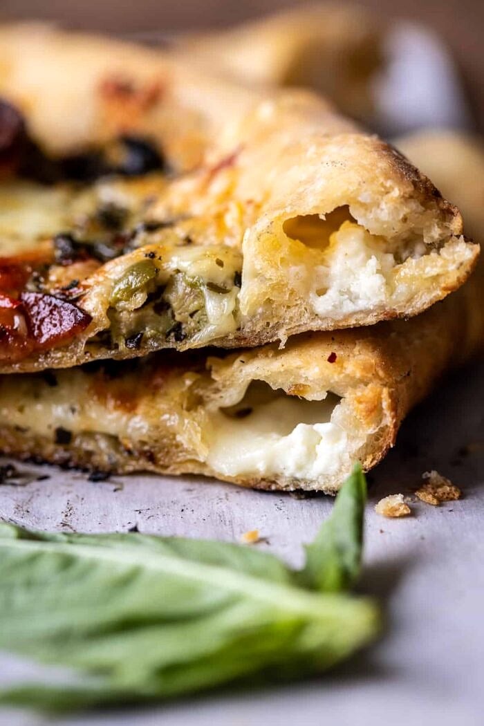 Pesto Pizza with Feta Stuffed Crust | halfbakedharvest.com