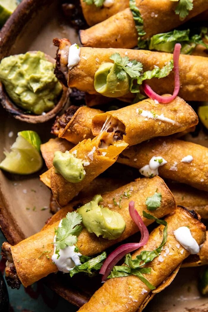 close up photo of Queso Fundido Taquitos=