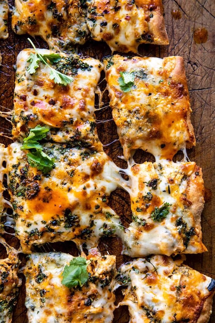 overhead close up photo of Sheet Pan Buffalo Chicken Pizza