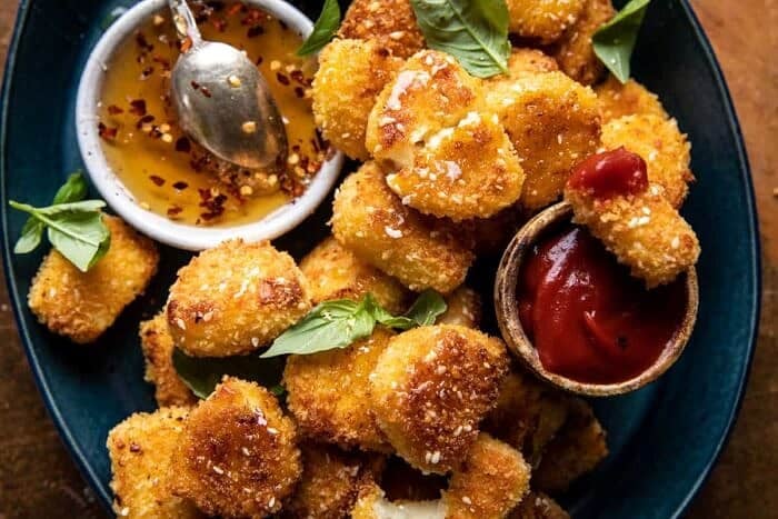 overhead horizontal photo of Oven Fried Halloumi Bites with Hot Honey 