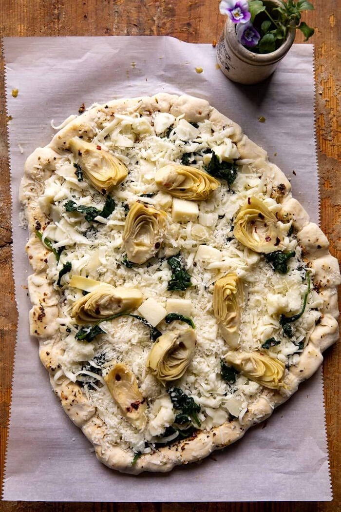 Spinach and Artichoke Pizza with Cheesy Bread Crust | halfbakedharvest.com