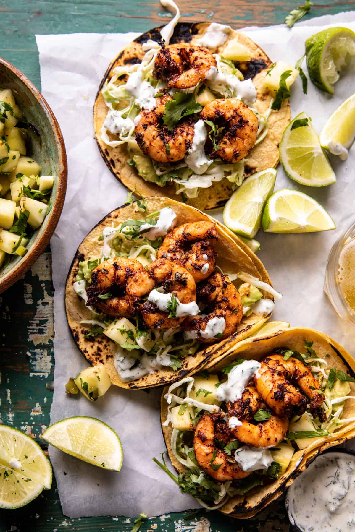 Sheet Pan Jalapenฬo Pineapple Shrimp Tacos with Cilantro Garlic Sauce | halfbakedharvest.com