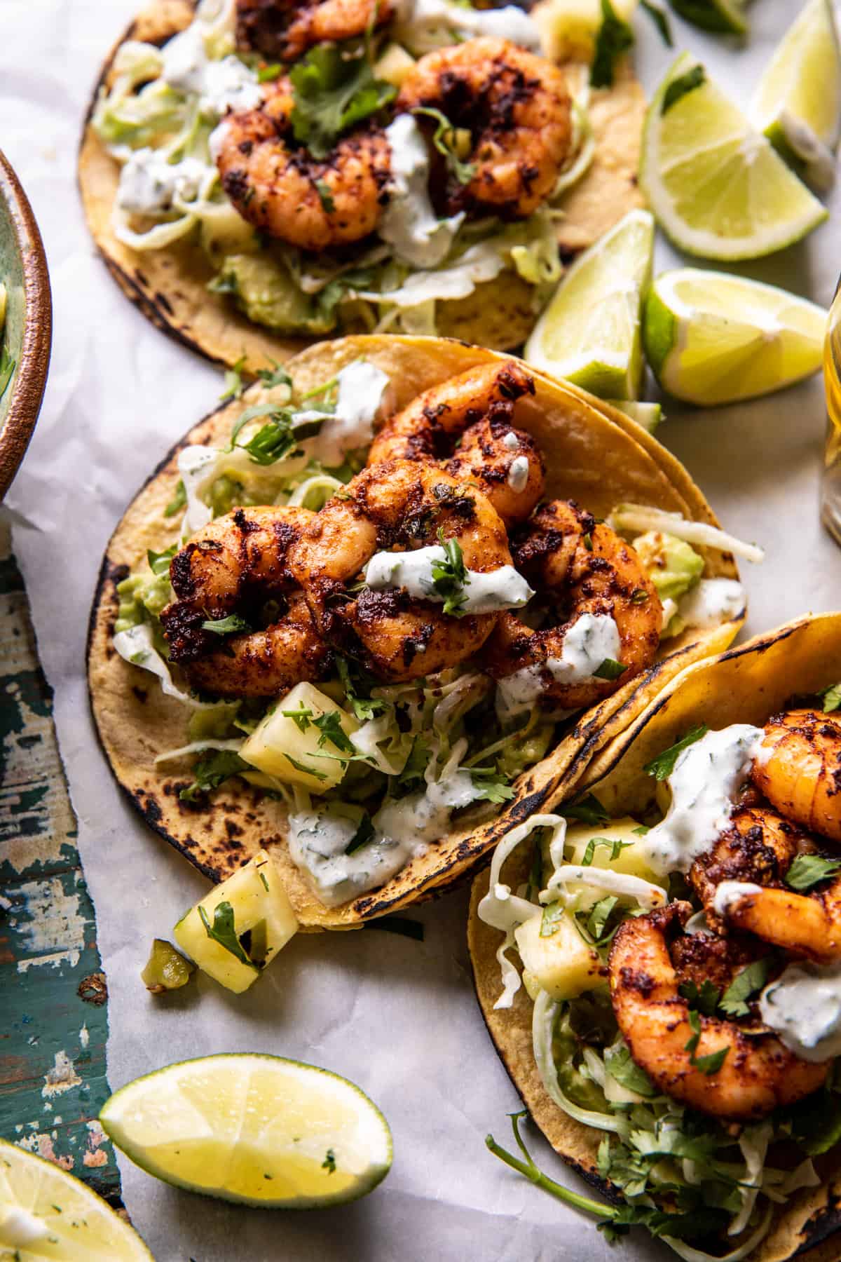 Sheet Pan Jalapenฬo Pineapple Shrimp Tacos with Cilantro Garlic Sauce | halfbakedharvest.com