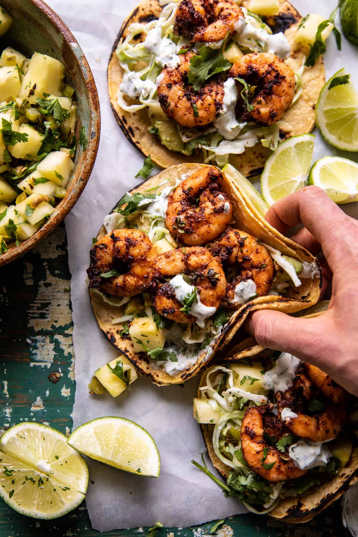 Sheet Pan Jalapenฬo Pineapple Shrimp Tacos with Cilantro Garlic Sauce | halfbakedharvest.com