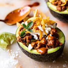 Taco Stuffed Avocados with Chipotle Sauce and Cilantro Lime Ranch | halfbakedharvest.com