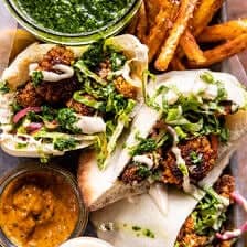 Roasted Cauliflower Pitas with Zhug and Garlic Tahini | halfbakedharvest.com