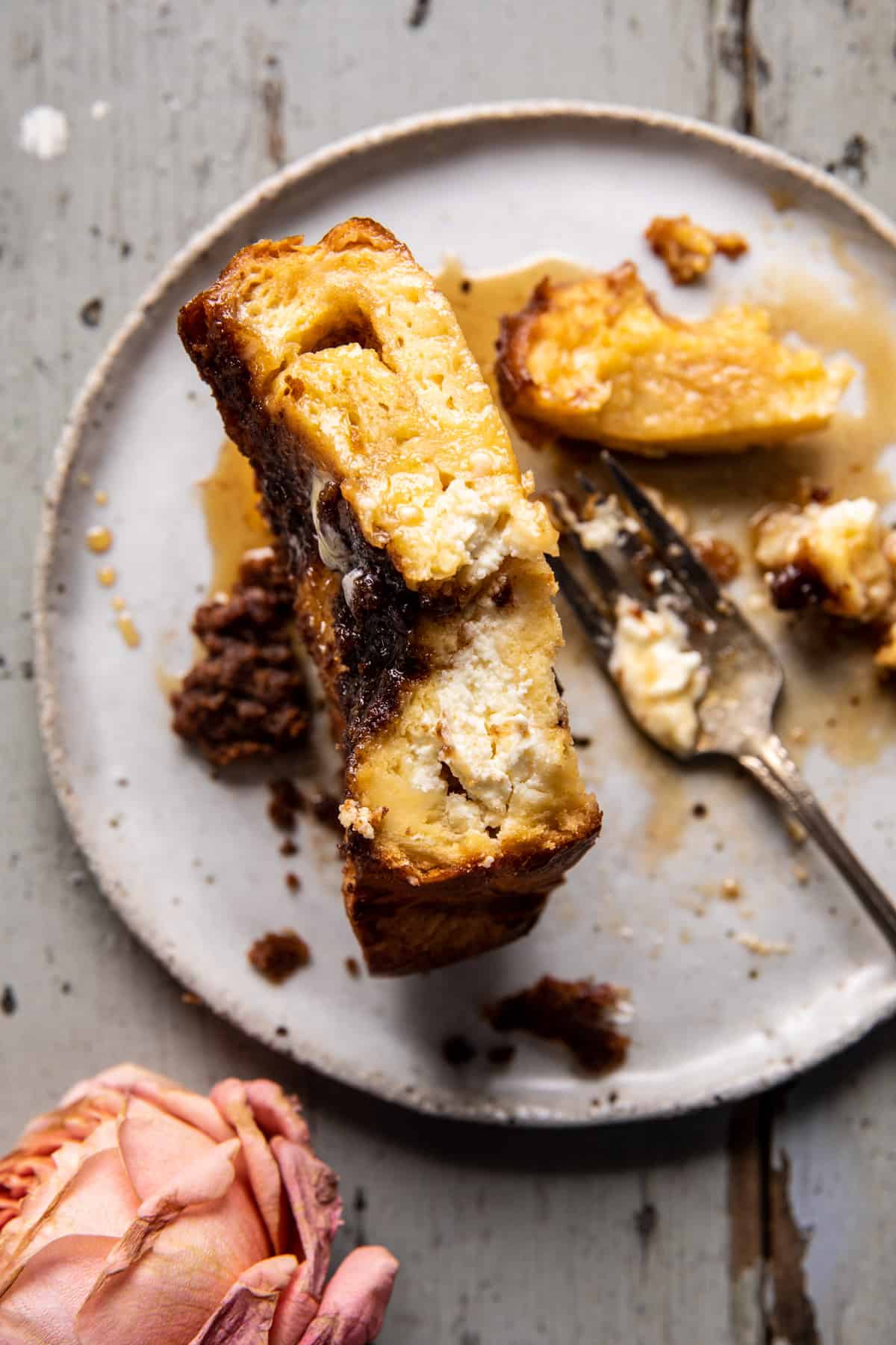 french toast on plate close up showing cream cheese in the middle 