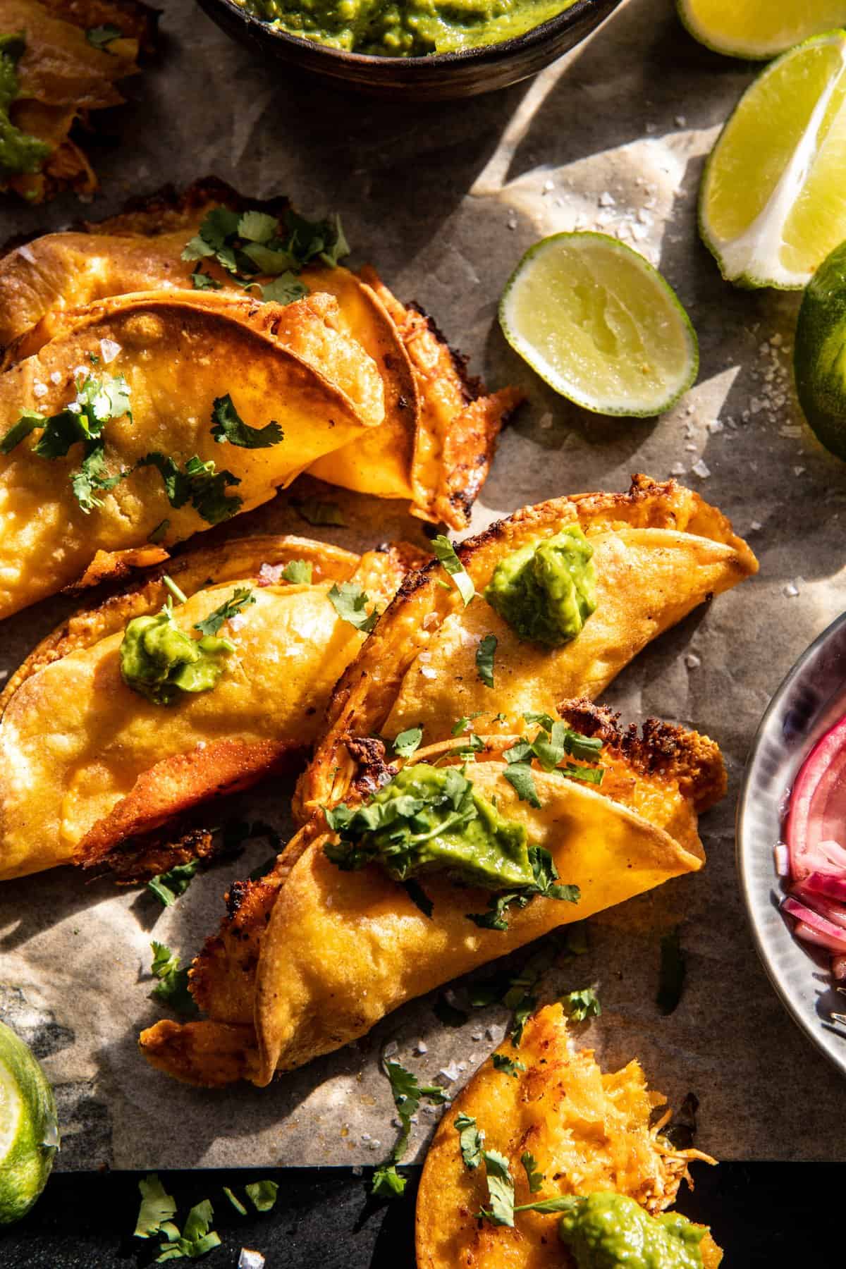 Crockpot Crispy Chicken Tinga Tacos with Avocado Jalapenฬo Crema | halfbakedharvest.com