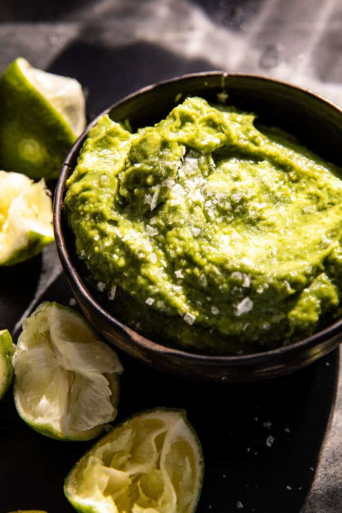 Crockpot Crispy Chicken Tinga Tacos with Avocado Jalapenฬo Crema | halfbakedharvest.com