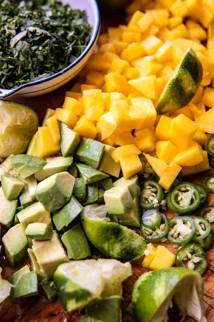 Crispy BBQ Salmon Tacos with Avocado Mango Salsa and Jalapeno Cream | halfbakedharvest.com