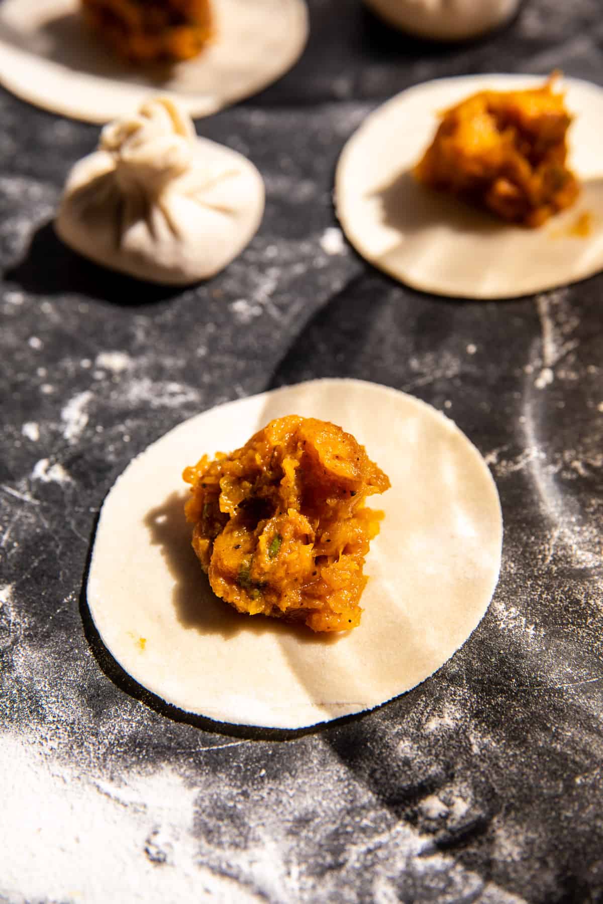 Chili Crisp Butternut Squash Dumplings in Ginger Soy Broth | halfbakedhavrest.com