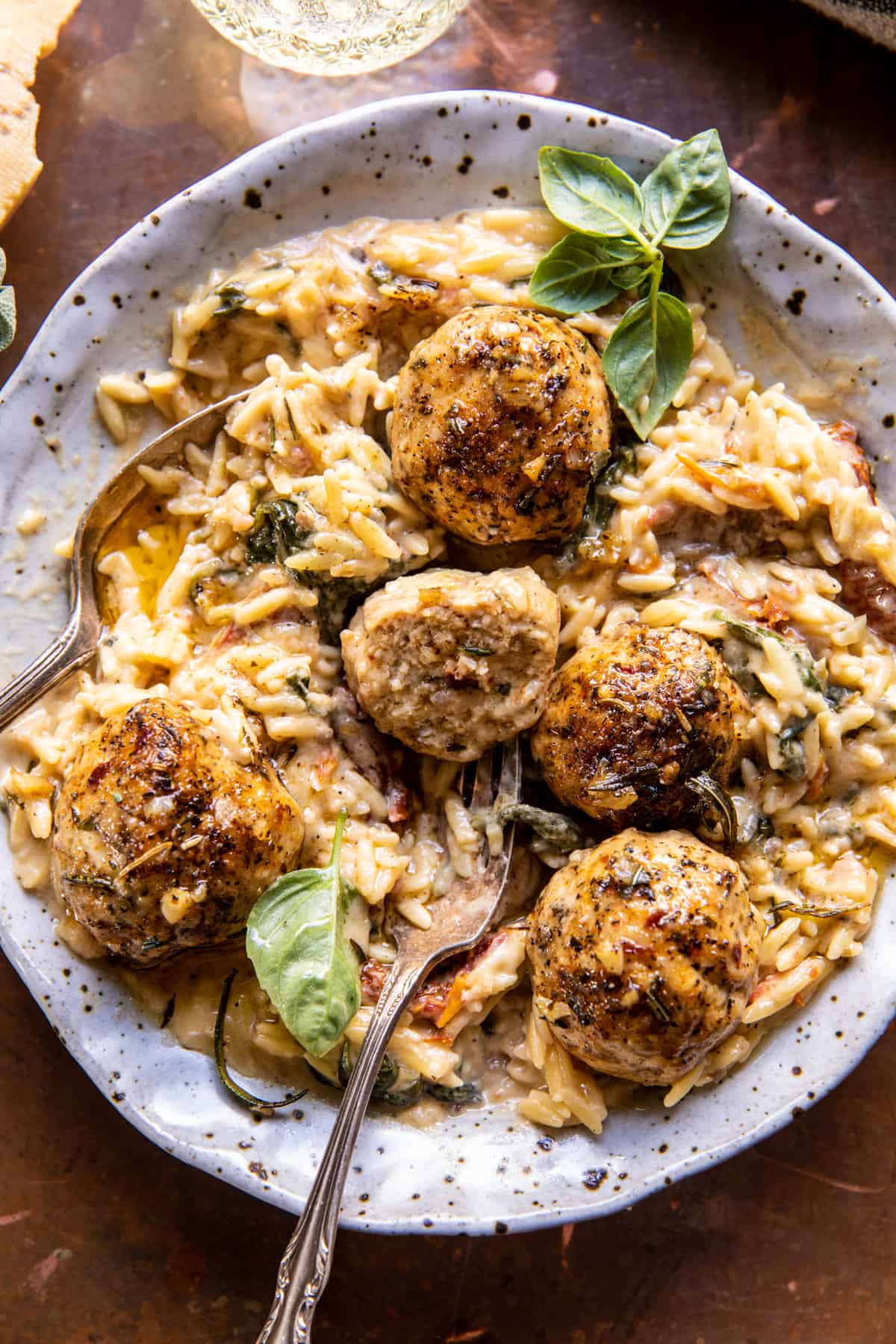 Crockpot Garlic Butter Chicken Meatballs with Creamy Orzo | halfbakedharvest.com