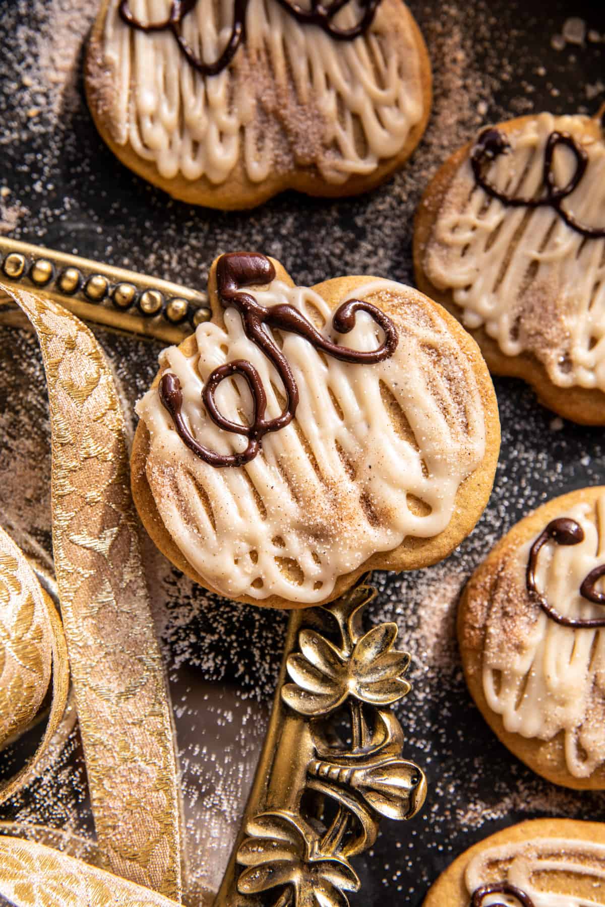 Soft Pumpkin Sugar Cookies with Cinnamon Brown Butter Frosting | halfbakedharvest.com