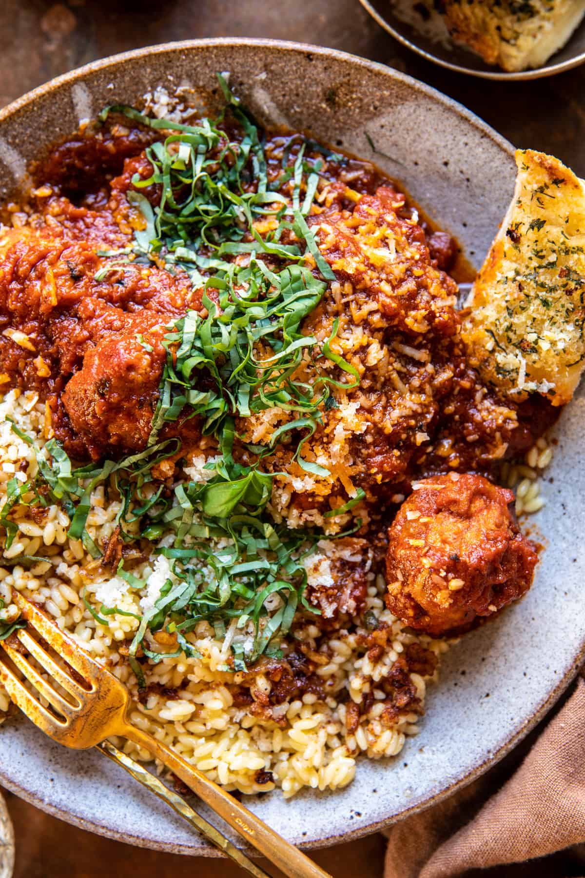 Saucy Braised Garlic Butter Meatballs with Orzo | halfbakedharvest.com
