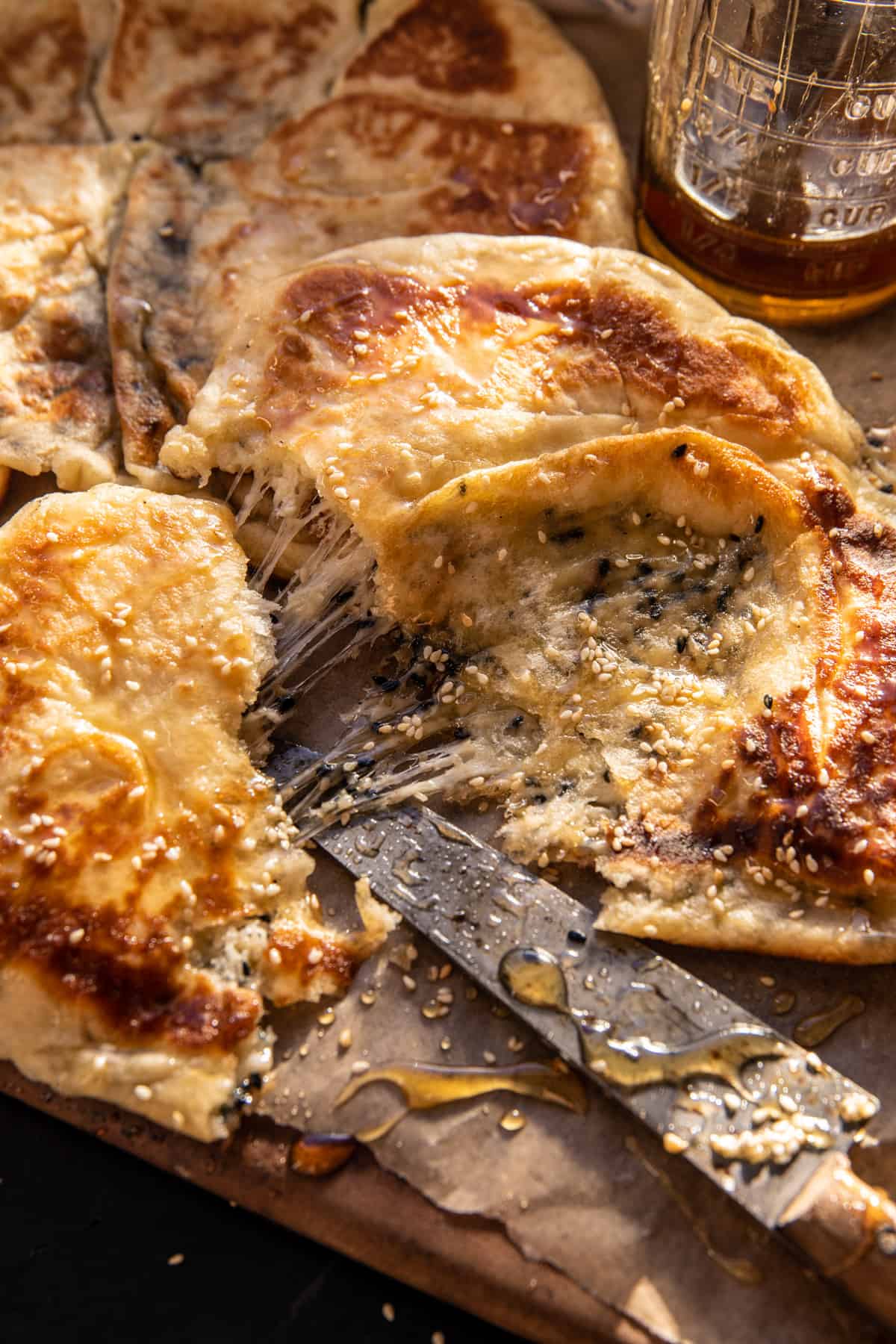 Sesame Gouda Stuffed Naan with Honey | halfbakedharvest.com