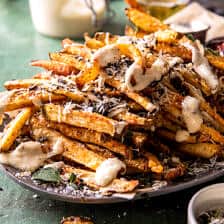 Garlic Parmesan French Fries Dressed in Caesar Dressing | halfbakedharvest.com