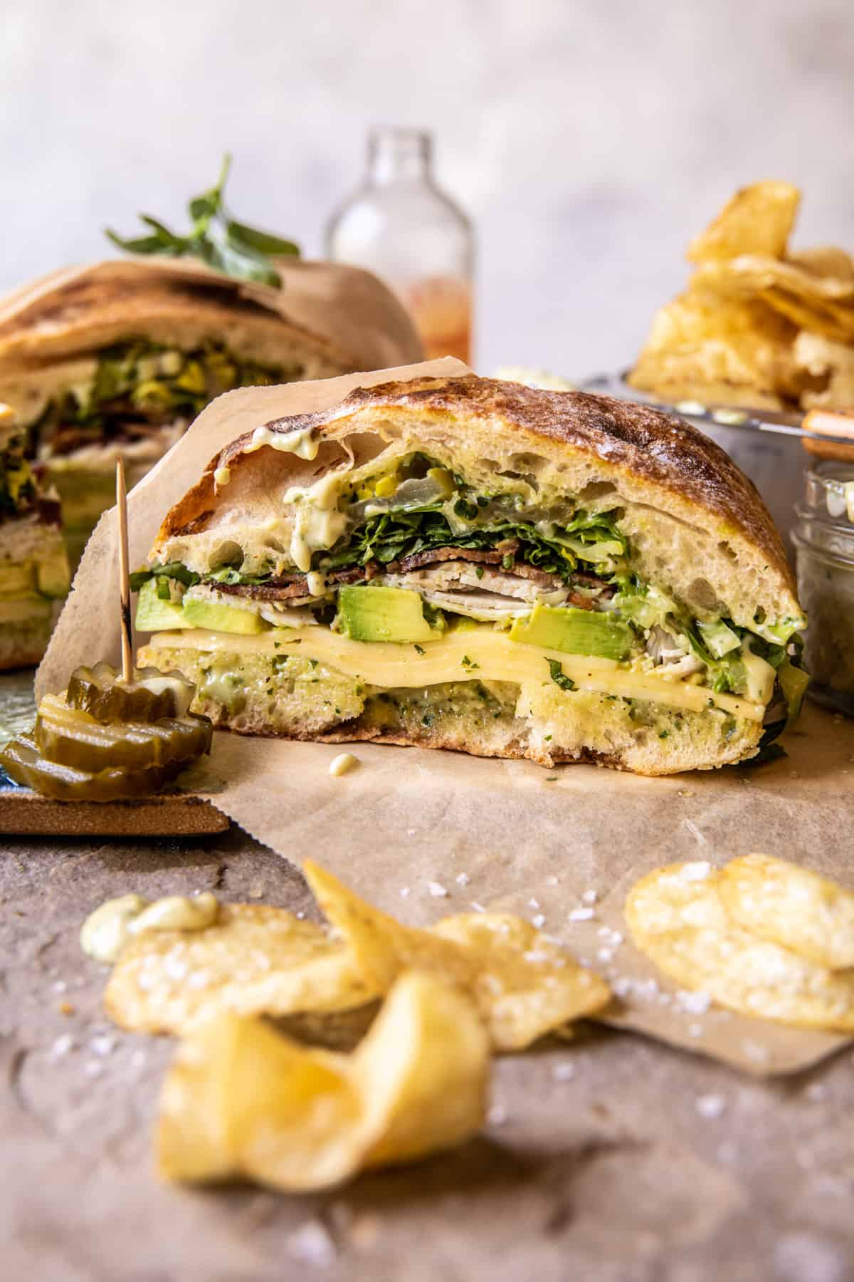 Picnic Style Pesto Turkey and Avocado Bacon Sandwich | halfbakedharvest.com