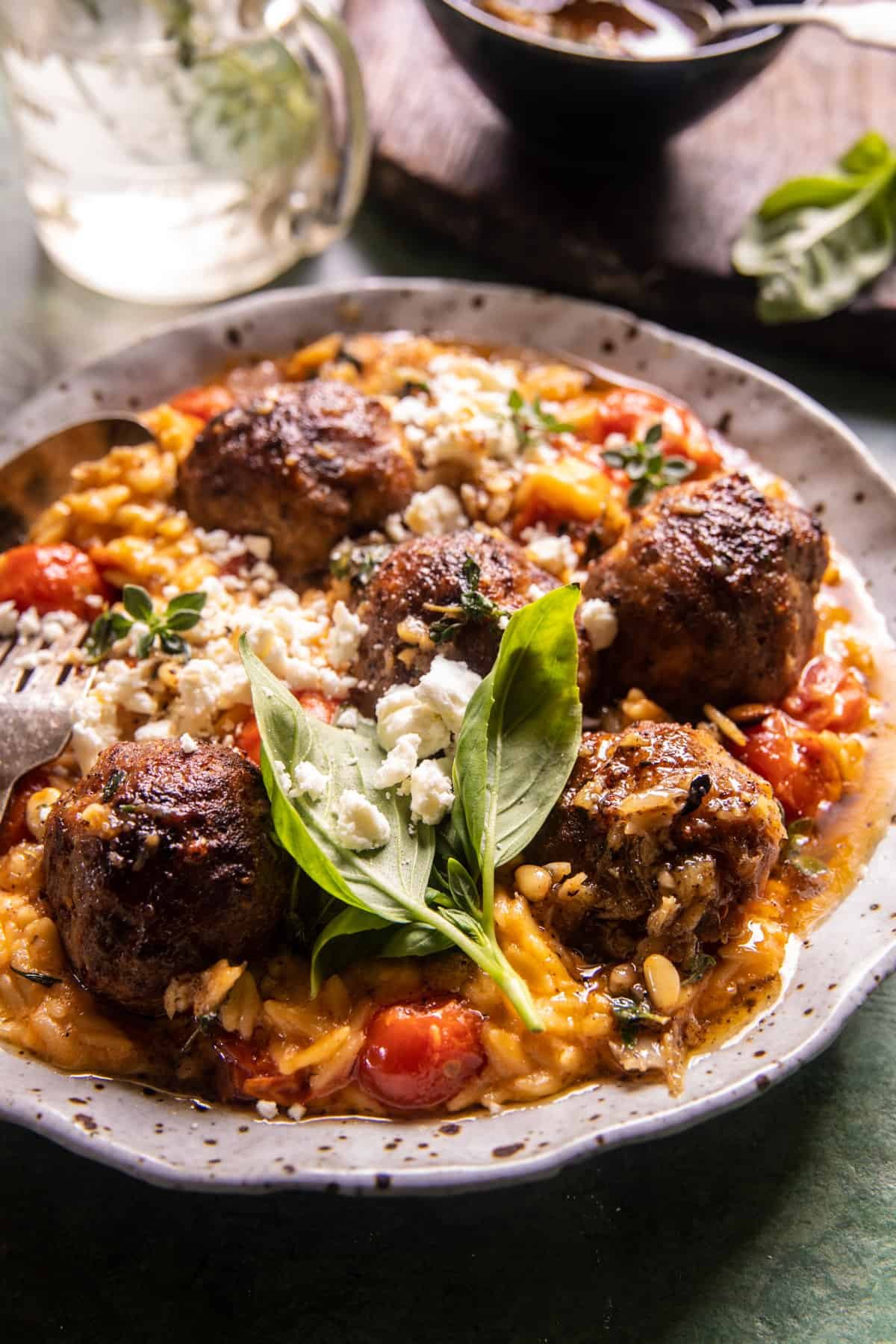 Crockpot Greek Chicken Meatballs with Creamy Tomato Orzo | halfbakedharvest.com