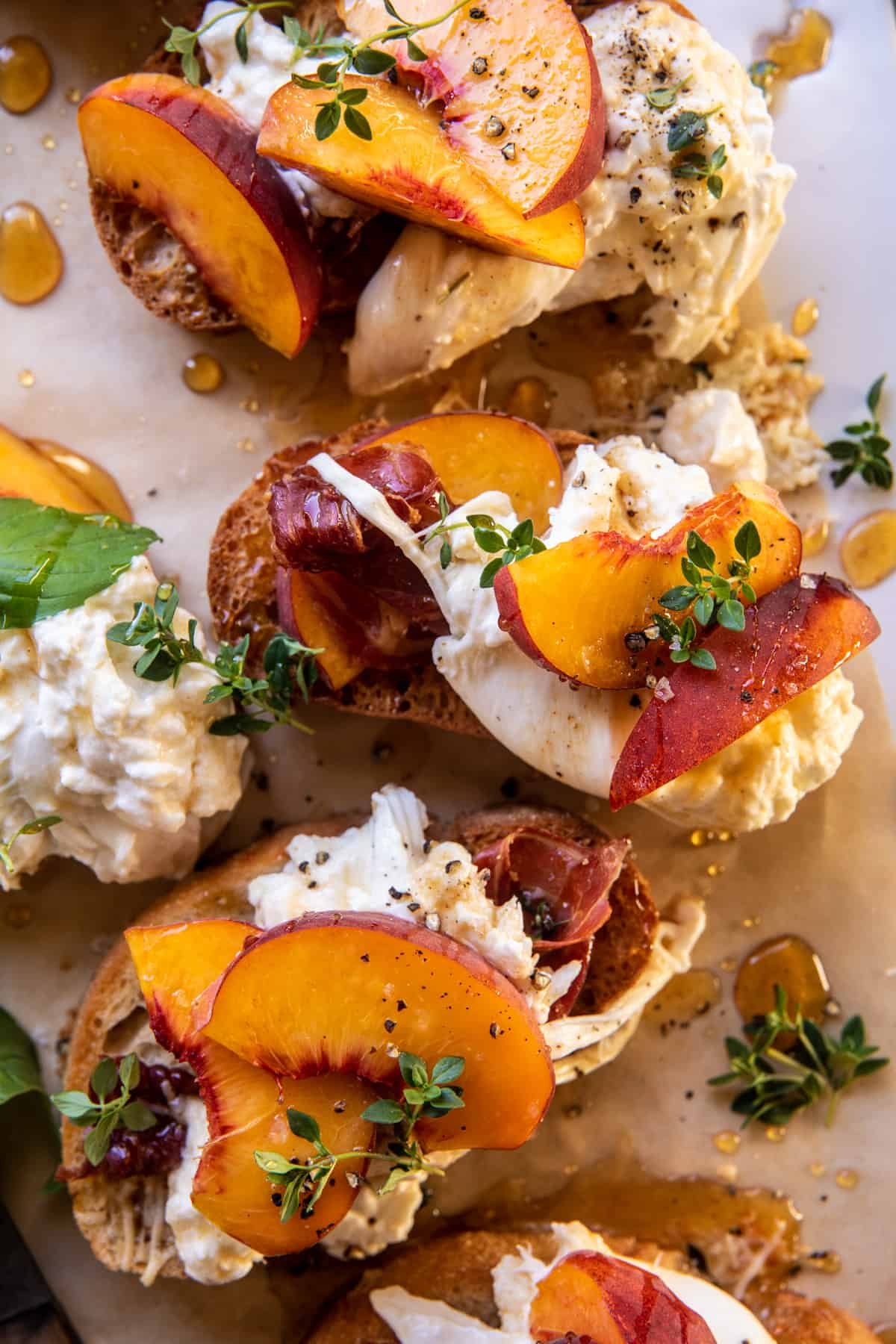 Peach Burrata Parmesan Crostini with Hot Honey | halfbakedharvest.com