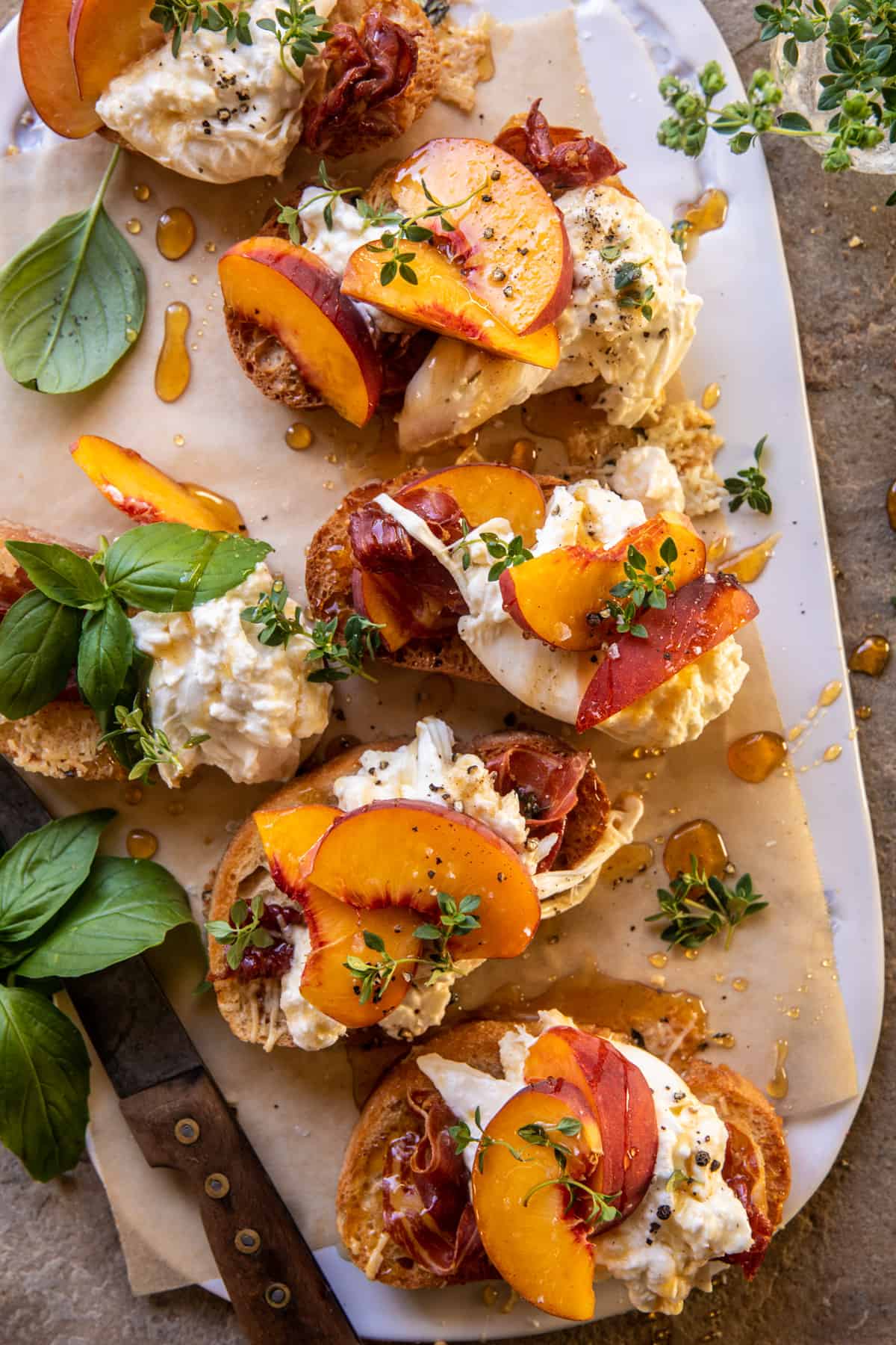 Peach Burrata Parmesan Crostini with Hot Honey | halfbakedharvest.com