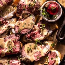 Beef Tenderloin Crostini with Parmesan Wine Cream Sauce| halfbakedharvest.com