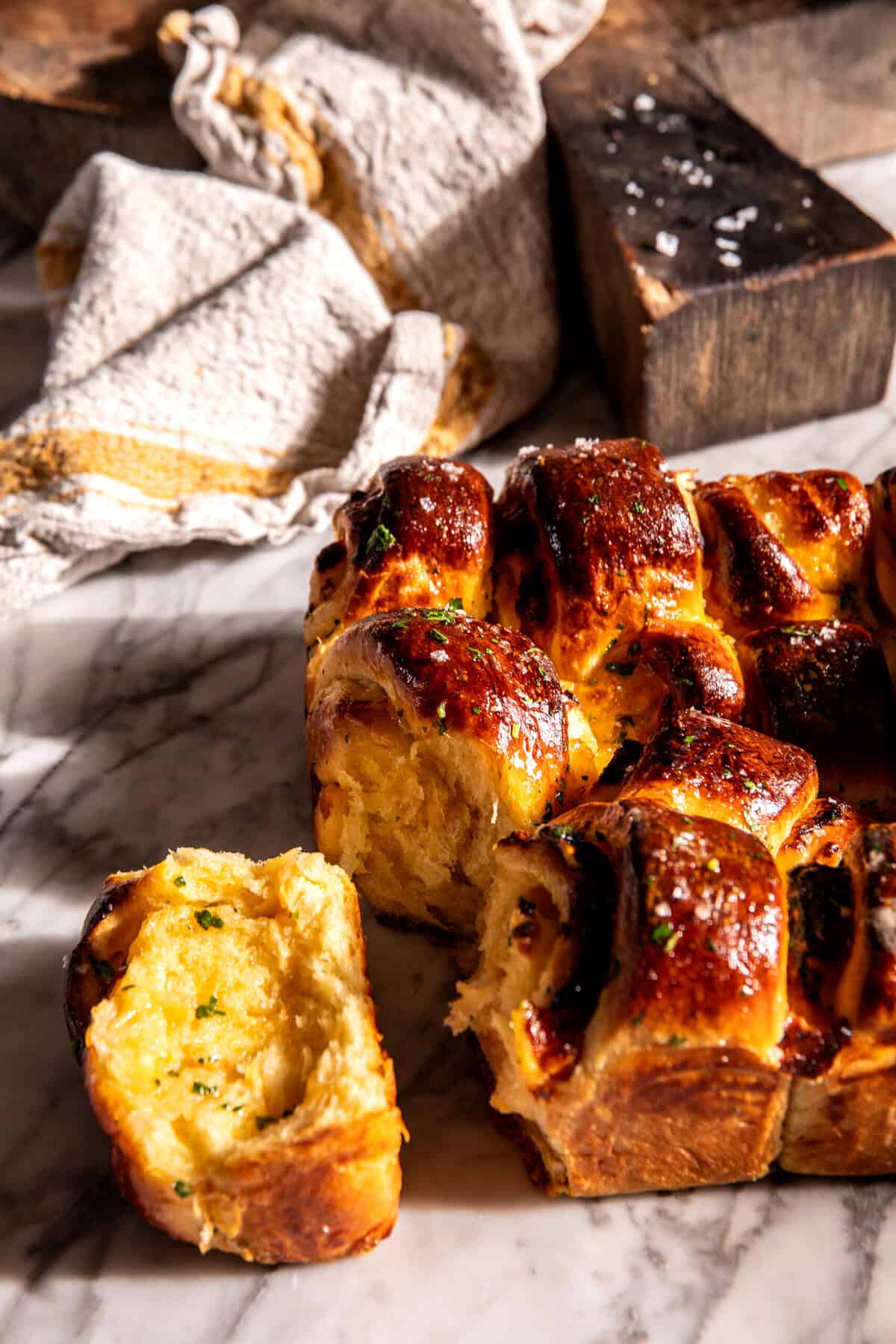 Salted Honey Butter Cheddar Brioche Rolls | halfbakedharvest.com