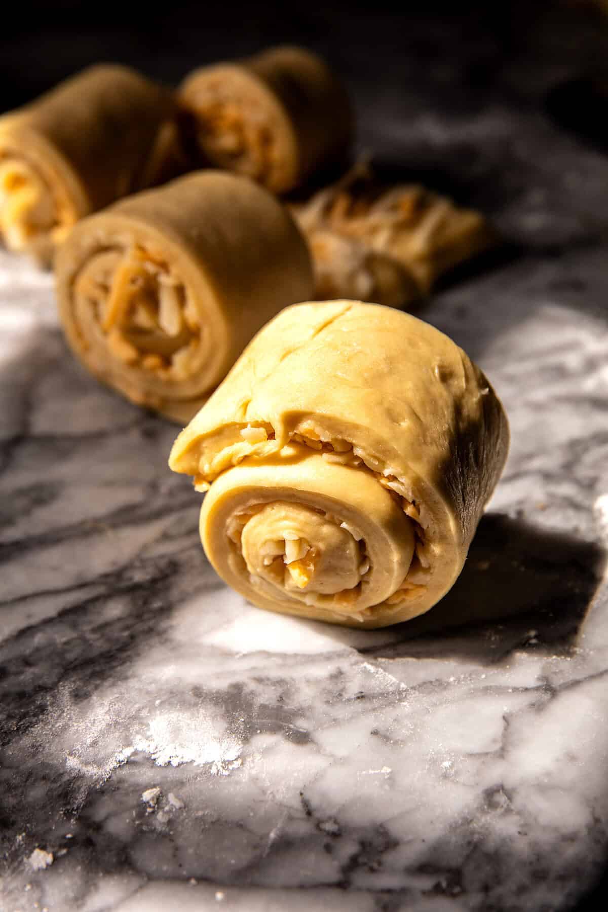 Salted Honey Butter Cheddar Brioche Rolls | halfbakedharvest.com