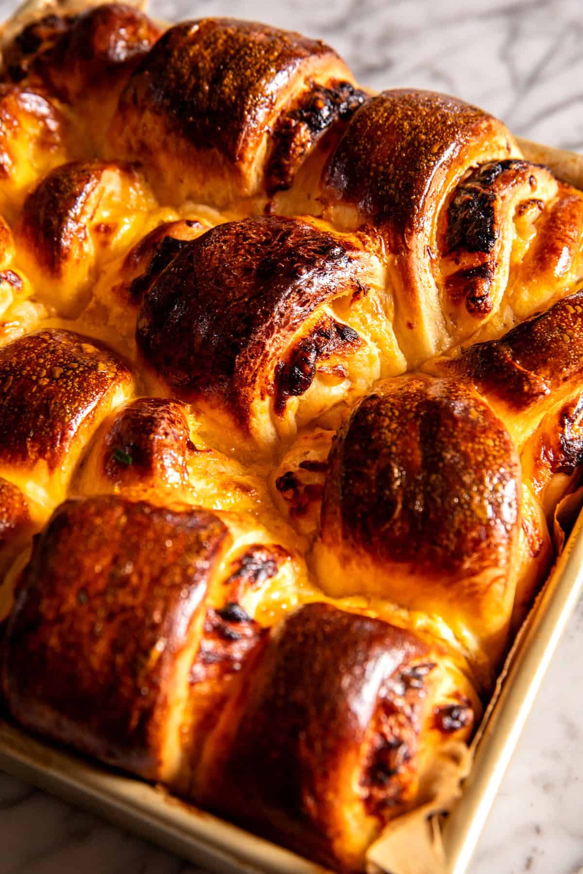 Salted Honey Butter Cheddar Brioche Rolls | halfbakedharvest.com