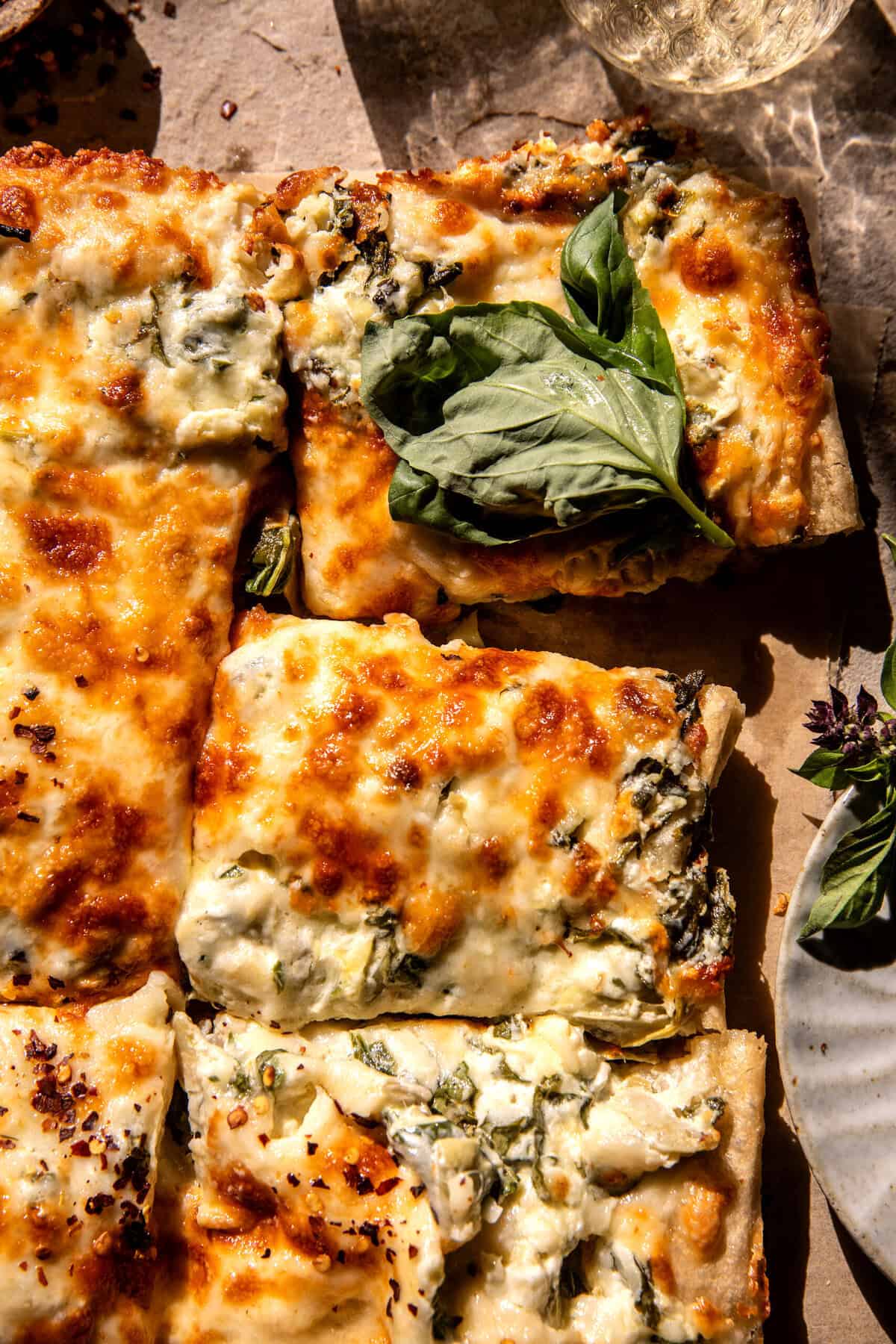 Sheet Pan Spinach Artichoke Dip Pizza | halfbakedharvest.com